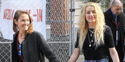 Amber Heard is in a relationship with Bianca Butti.